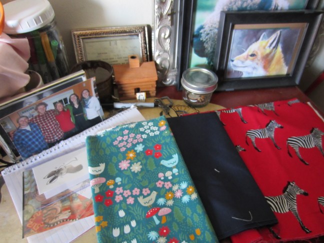 Still life with fabrics and fox